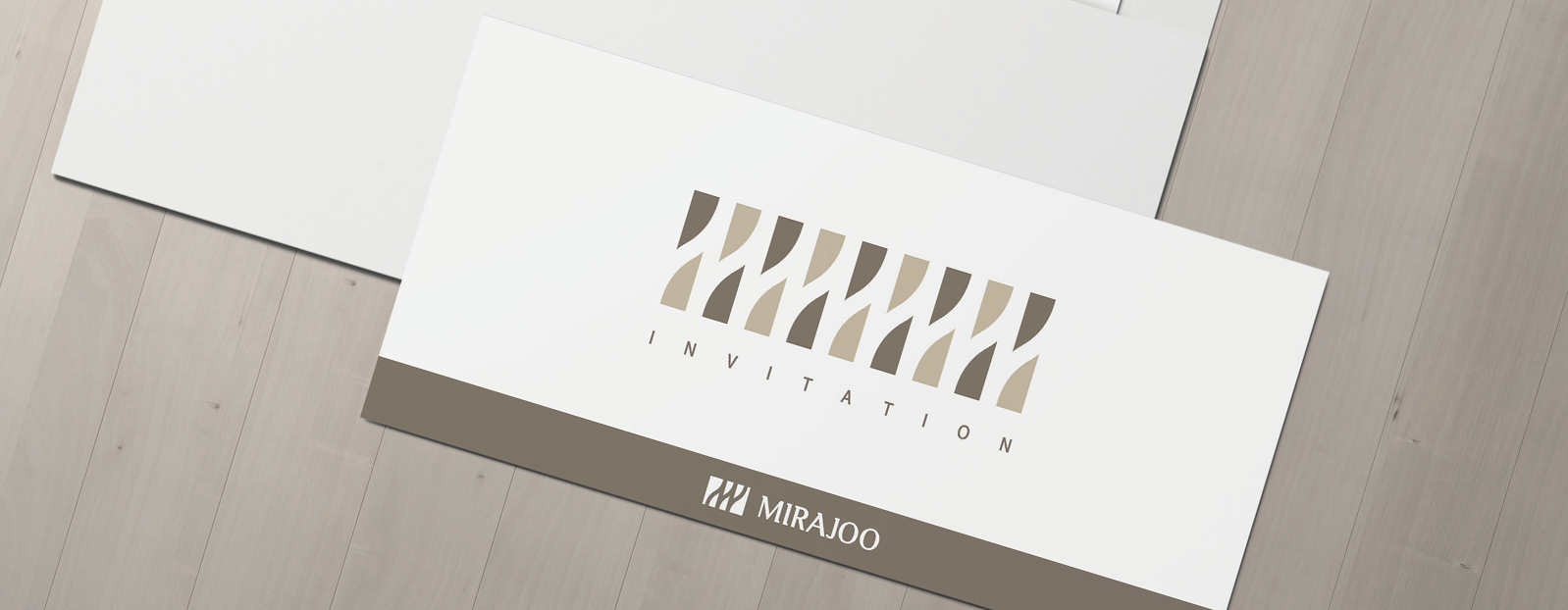 미라주 초대장 디자인 목업 이미지, 상단에 그래픽 패턴과 INVITATION 문구, 하단에 MIRA JOO 로고가 배치된 모습